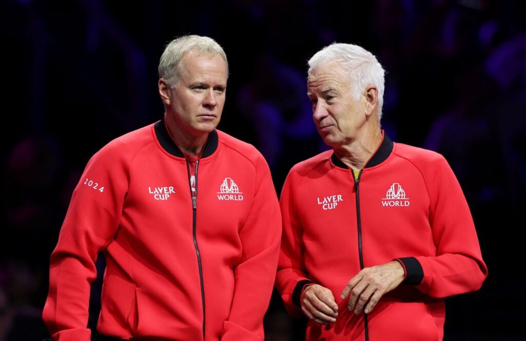 Patrick McEnroe, Vice-Captain of Team World, and John McEnroe, Captain of Team World, speak during a Team World Practice Session at Uber Arena.