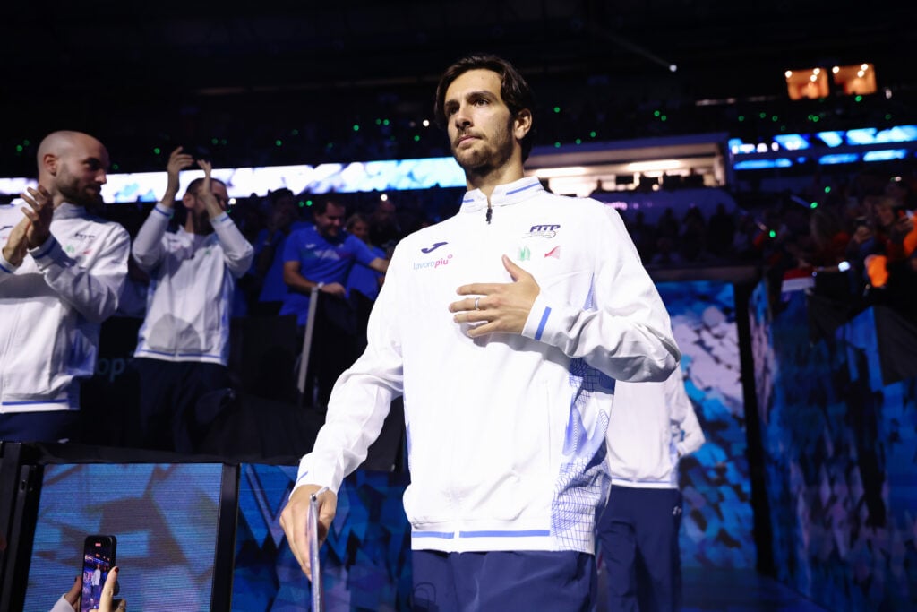 Lorenzo Musetti walks on court ahead of the 2024 Davis Cup Final