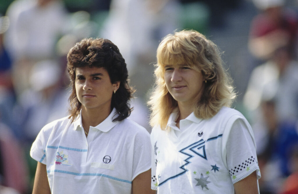 Argentinian tennis player Gabriela Sabatini and her opponent, German tennis player Steffi Graf at the Women's Singles final of the 1988 Summer Olympics tennis competition, at the Seoul Olympic Park Tennis Center in Seoul.
