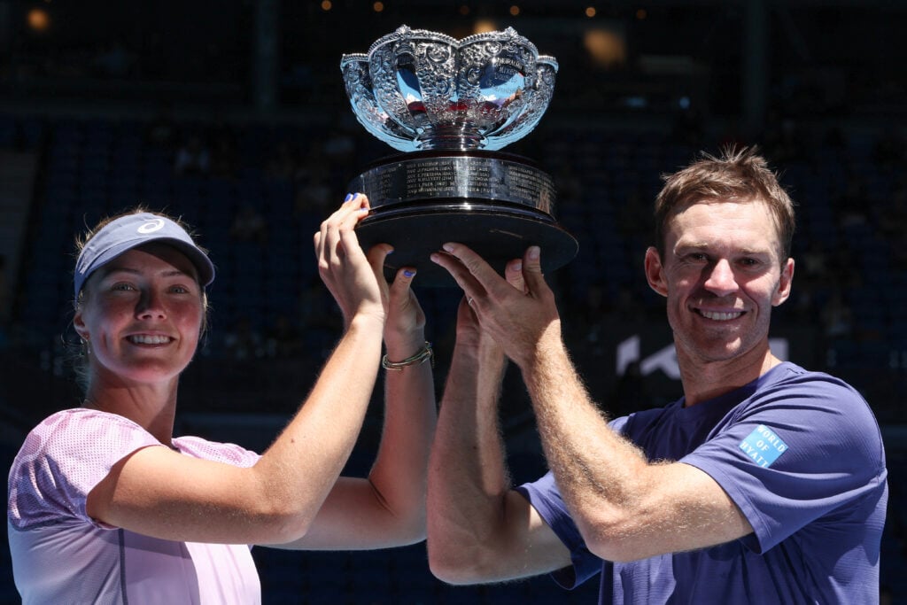 Olivia Gadecki and John Peers celebrate with the Australian Open title in 2025