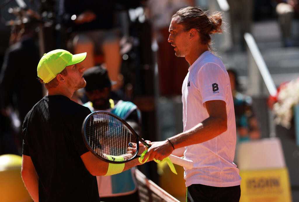 Alejandro Davidovich Fokina and Alexander Zverev shake hands at the net after their match at the 2025 Madrid Open