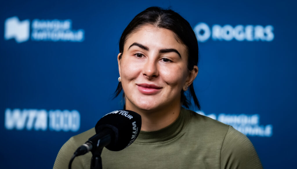Bianca Andreescu of Canada talks to the media after being forced to with draw from the second round on Day 3 of the National Bank Open at Stade IGA.