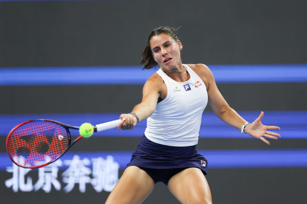 Emma Navarro of the United States competes in the Women's Singles Round of 16 match against Iga Swiatek of Poland on day 10 of the 2025 China Open at the National Tennis Center.
