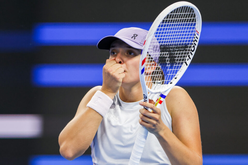 Iga Swiatek of Poland reacts in the Women's Singles Round of 16 match against Emma Navarro of the United States on day 10 of the 2025 China Open at the National Tennis Center.