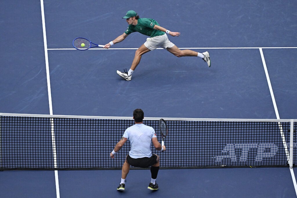 Alex de Minaur and Camilo Ugo Carabelli in action at the Shanghai Masters.