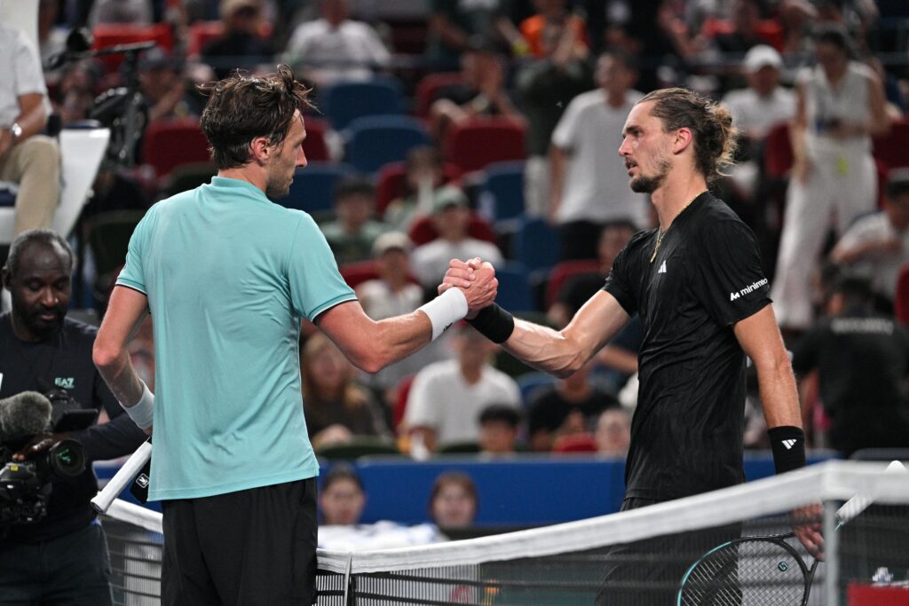 France's Arthur Rinderknech greets Germany's Alexander Zverev after winning their men's singles match at the Shanghai Masters tennis tournament in Shanghai.