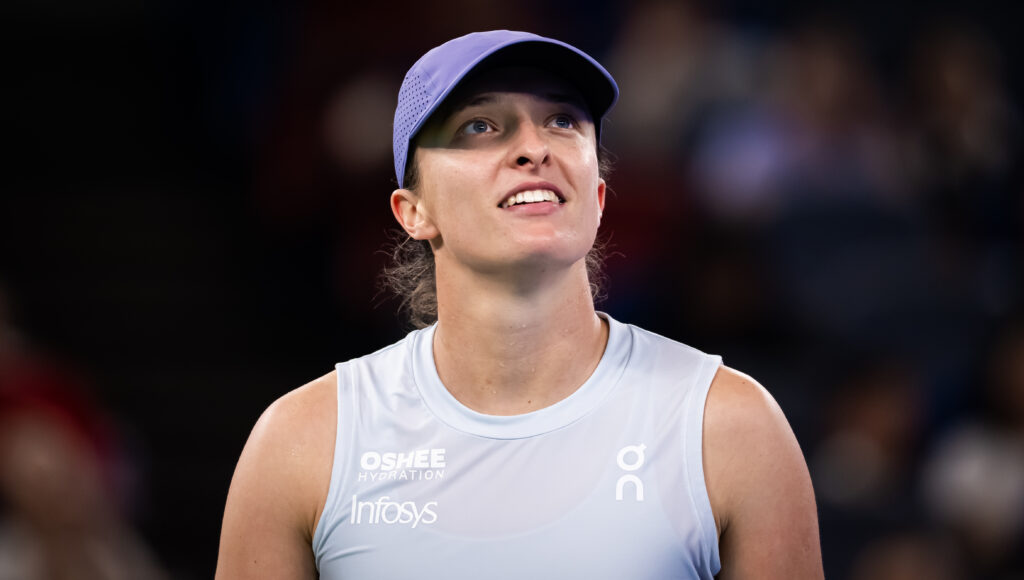 +Iga Swiatek of Poland in action against Belinda Bencic of Switzerland in the third round on Day 6 of the Wuhan Open at Optics Valley International Tennis Center.