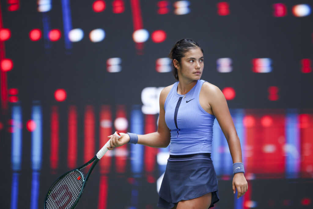 Emma Raducanu of Great Britain reacts in the Women's Singles Round of 64 match against Ann Li of United States on day 4 of 2025 Wuhan Open at Optics Valley International Tennis Center.
