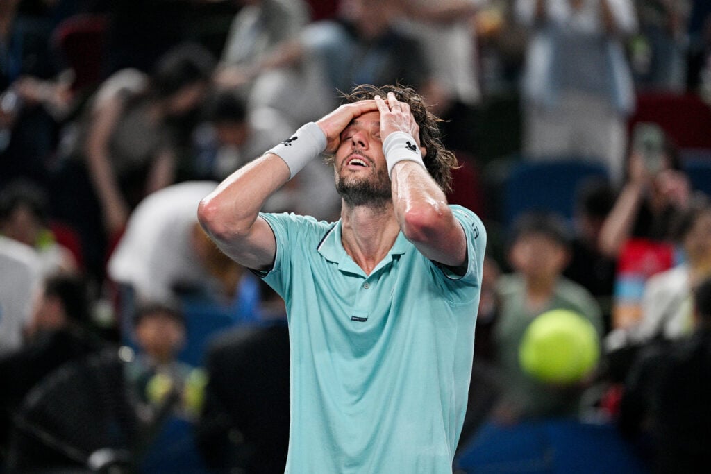 Arthur Rinderknech celebrates in Shanghai.
