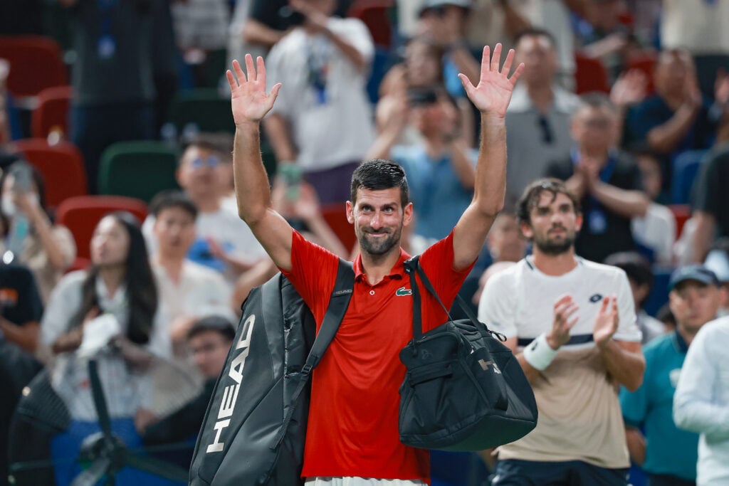 Novak Djokovic leaves the court after exiting the Shanghai Masters in 2025.