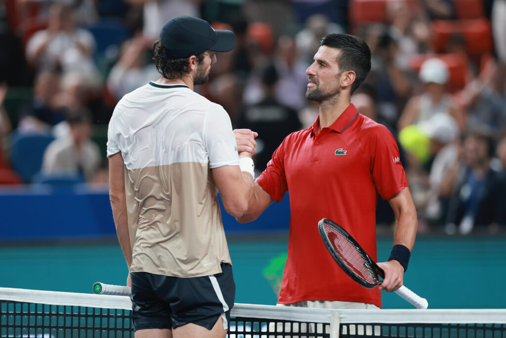 Novak Djokovic and Valentin Vacherot shake hands after their semifinal match at the Shanghai Masters.