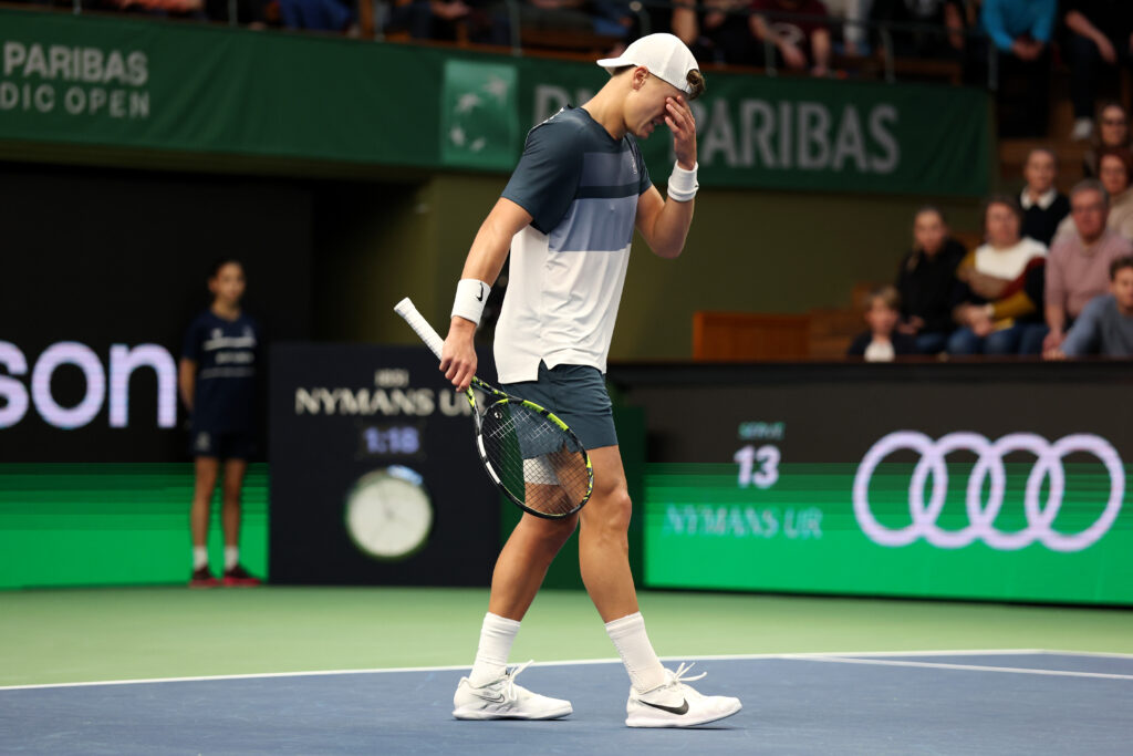 Holger Rune of Denmark reacts following an injury against Ugo Humbert of France during the Men's Singles semi-final match on day eight of the BNP Paribas Nordic Open 2025 at Royal Tennis Hall.