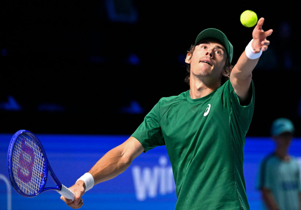 Alex de Minaur serving at the Vienna Open.