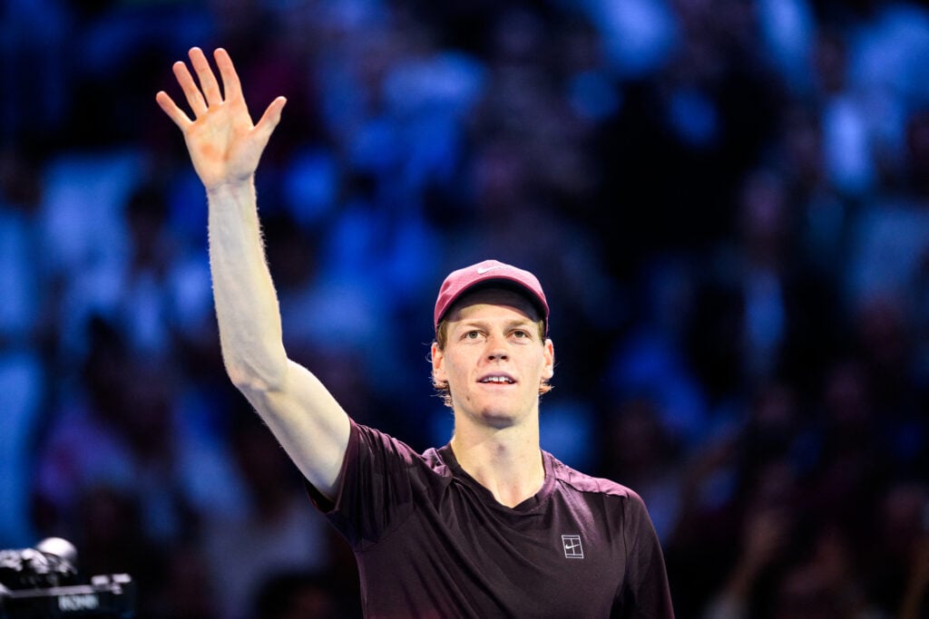 Jannik Sinner waves to the crowd at the Vienna Open.