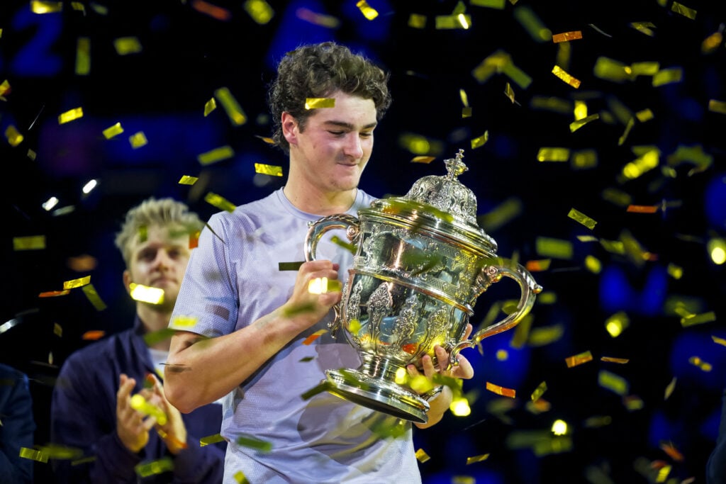 Joao Fonseca holds the 2025 Swiss Indoors title.