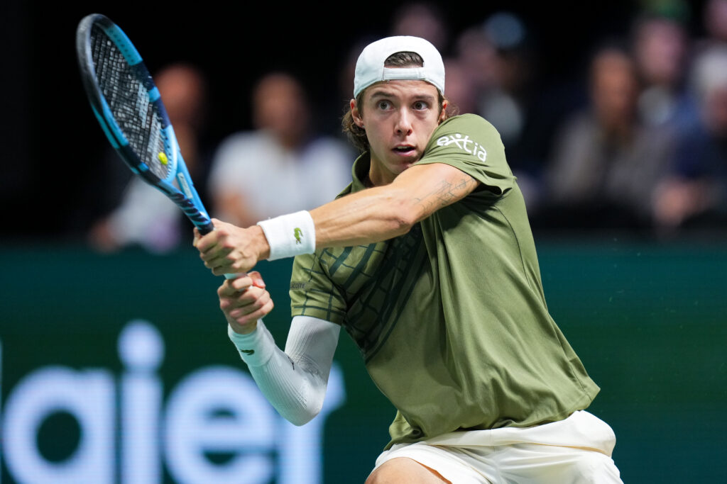 Arthur Cazaux hitting a backhand against Luciano Darderi in his first round match at the 2025 Paris Masters.
