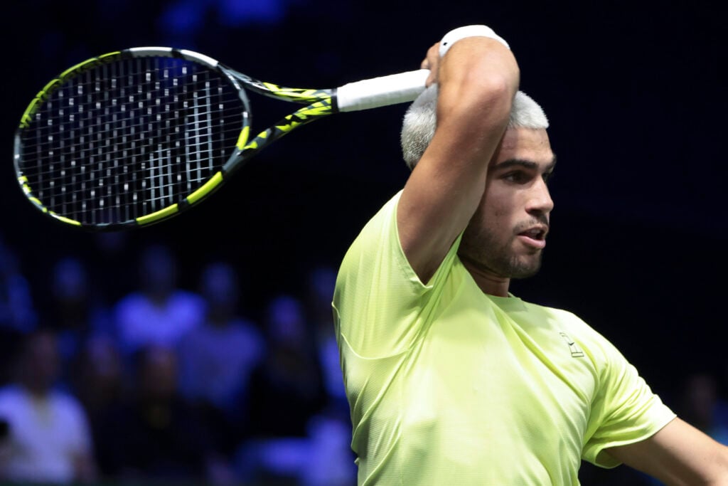 Carlos Alcaraz hits a forehand at the 2025 Paris Masters