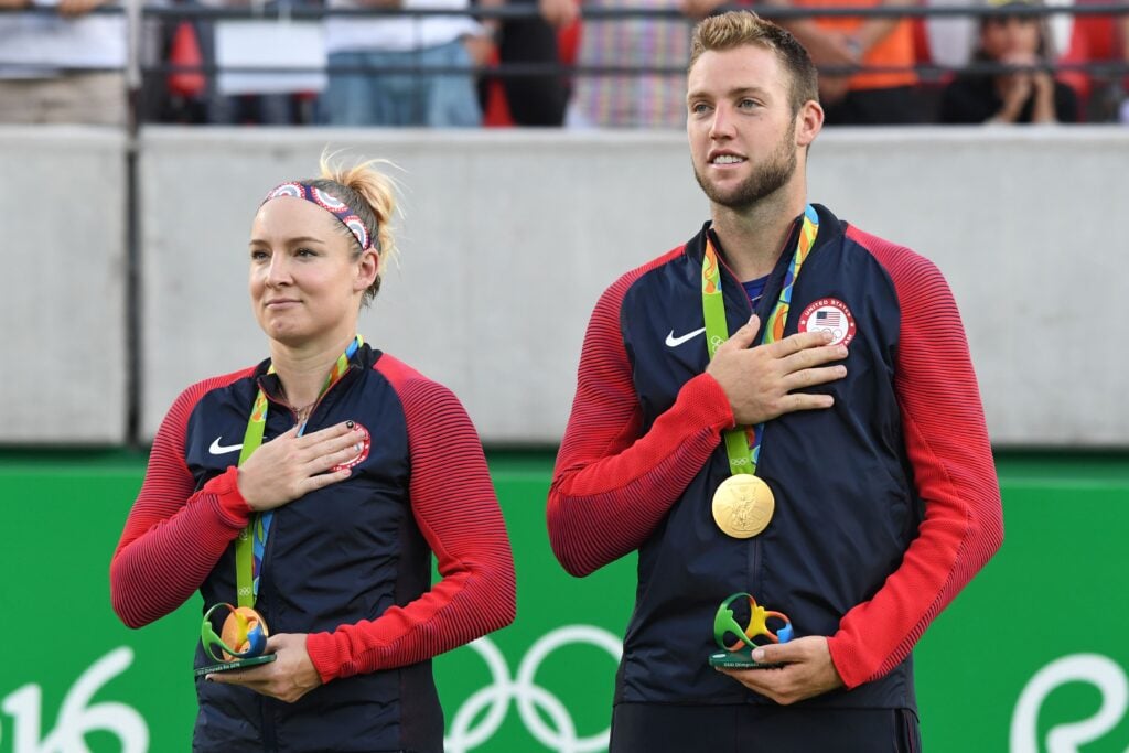 Jack Sock celebrates with his Olympic gold medal in 2016