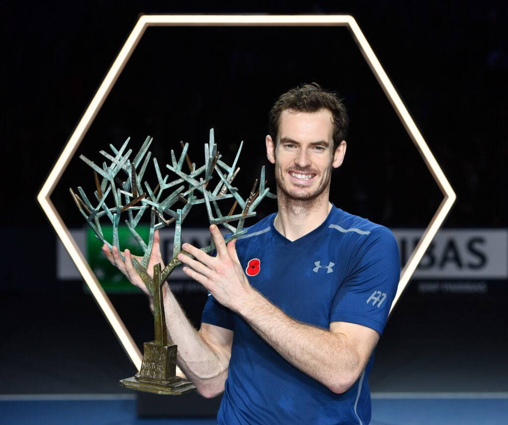 Andy Murray of Great Britain poses with the trophy after winning the BNP Paribas Masters title in Paris, France.
