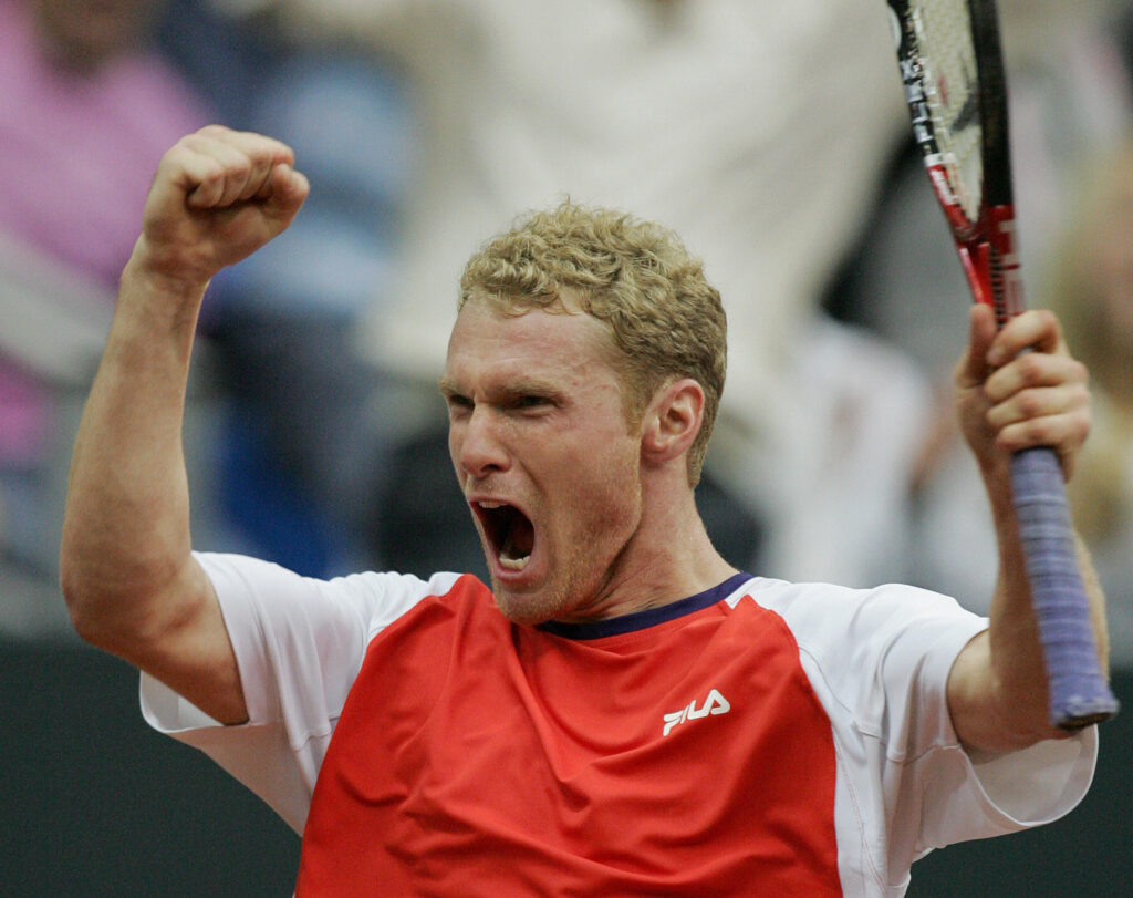 Dmitry Tursunov celebrates his win over Andy Roddick at the 2006 Davis Cup