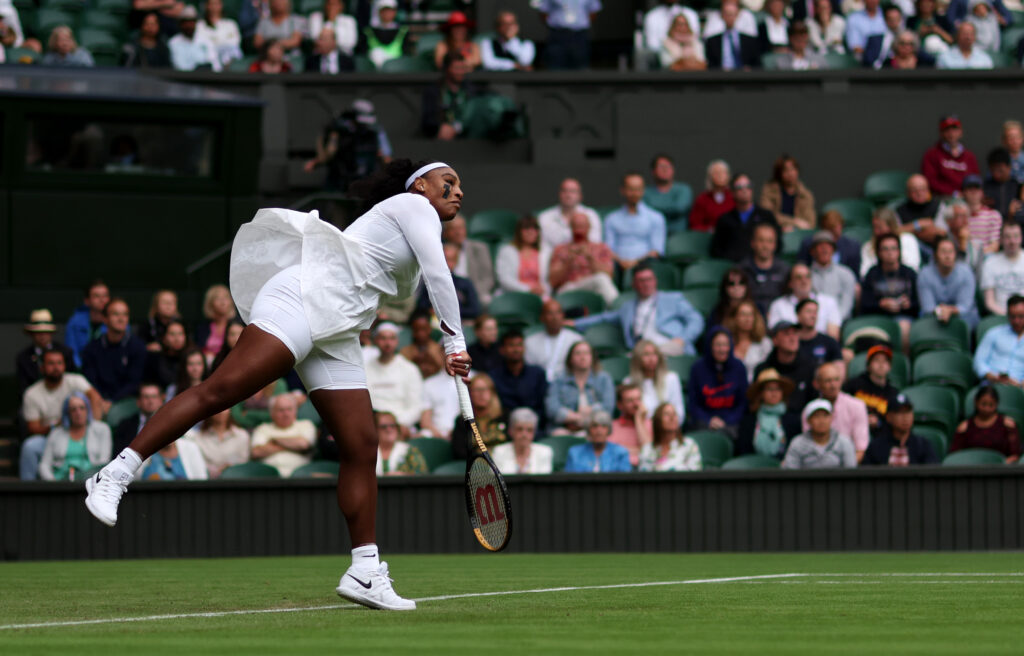 Serena Williams serves