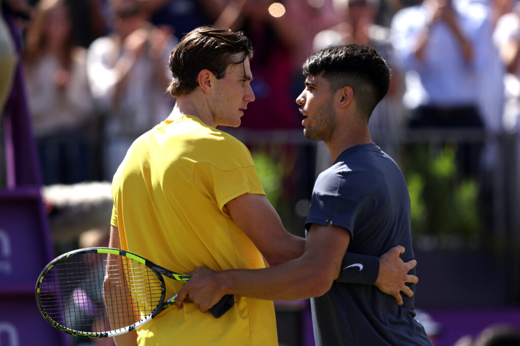 Jack Draper and Carlos Alcaraz embrace.