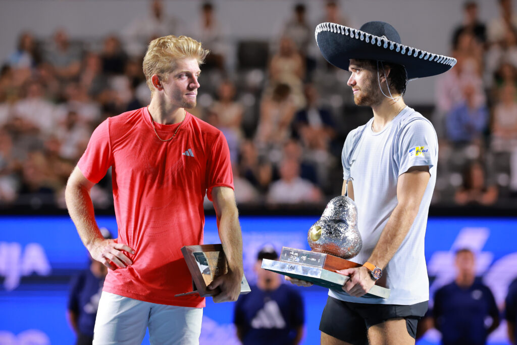 Alejandro Davidovich Fokina and Tomas Machac pose with their trophies after the 2025 Mexican Open final