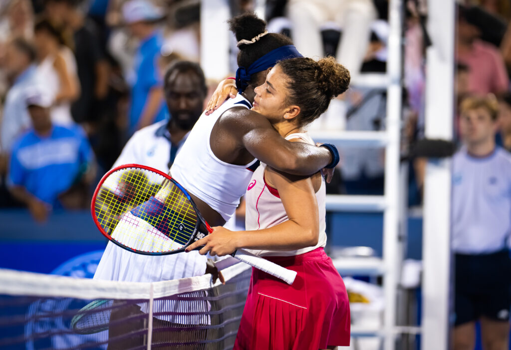 Coco Gauff hugs Jasmine Paolini after losing to her at the 2025 Cincinnati Open.