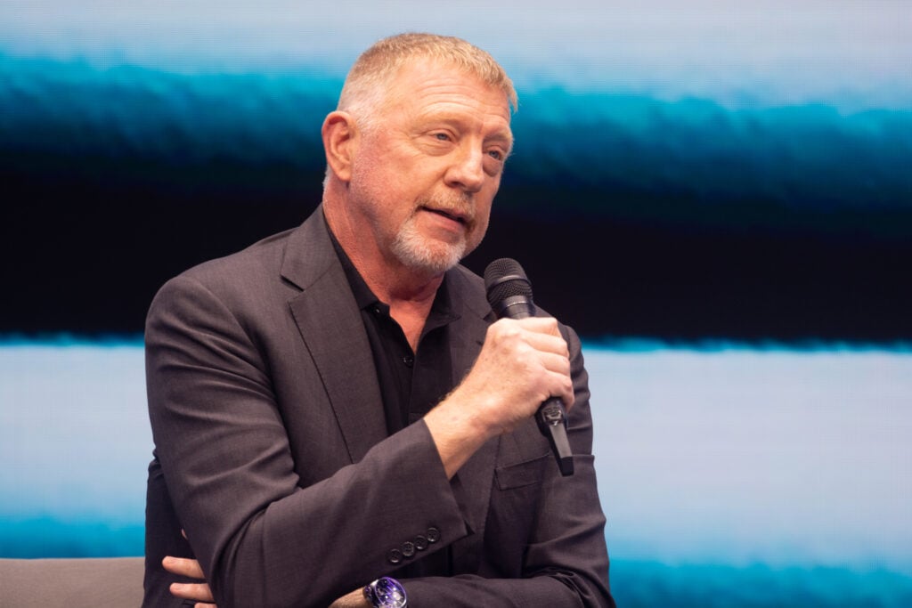 Boris Becker pictured at a conference in 2025