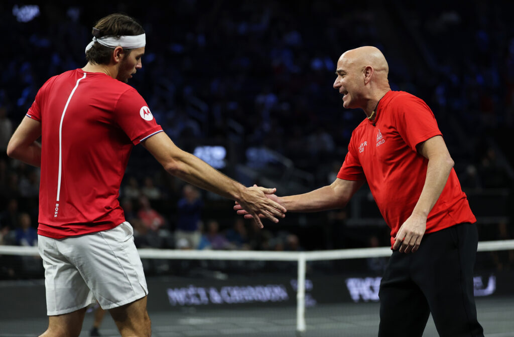 Taylor Fritz and Andre Agassi high five