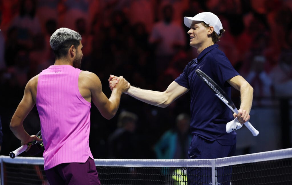 Carlos Alcaraz and Jannik Sinner shake hands after the 2025 Six Kings Slam final