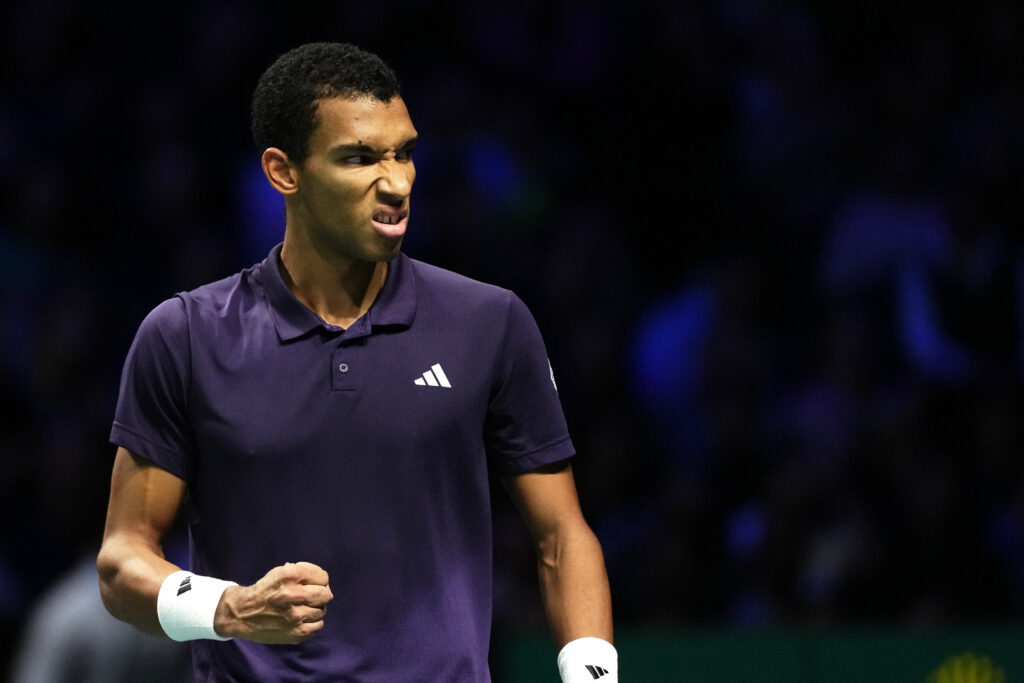 Felix Auger-Aliassime celebrates winning the first set against Alexander Bublik at the 2025 Paris Masters