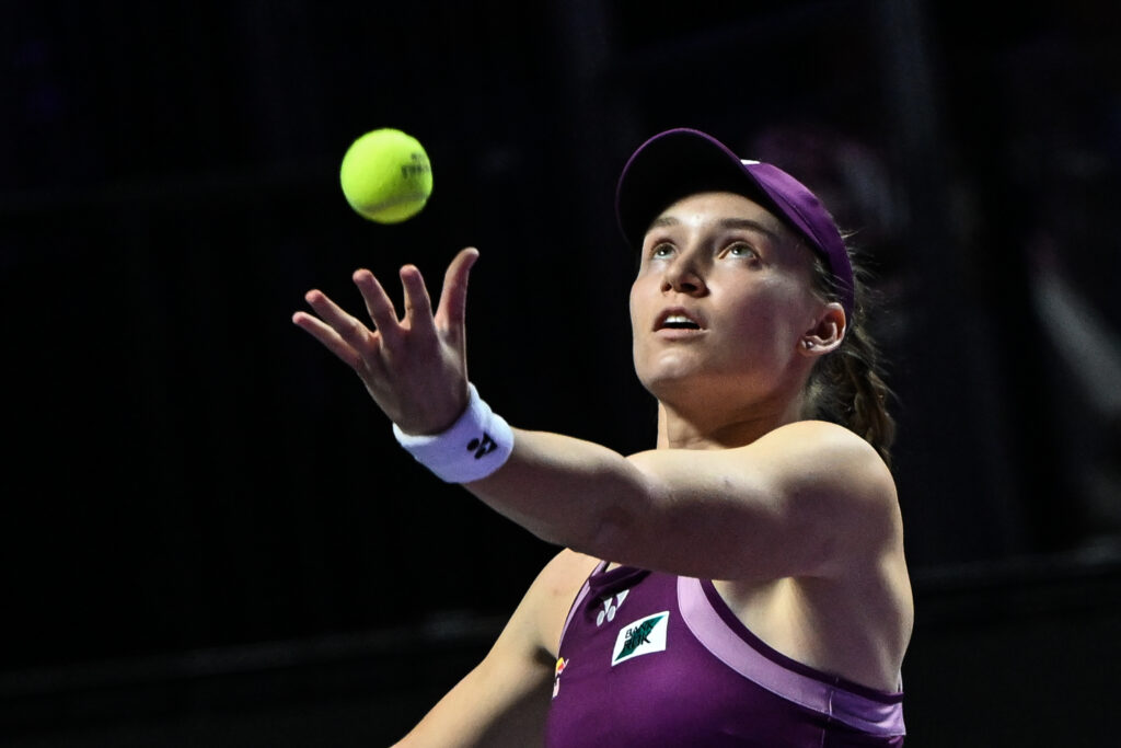 Elena Rybakina serves against Amanda Anisimova at the 2025 WTA Finals