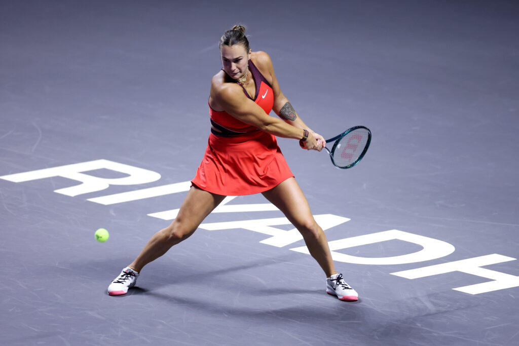 Aryna Sabalenka hits a backhand in her match against Jasmine Paolini at the 2025 WTA Finals.