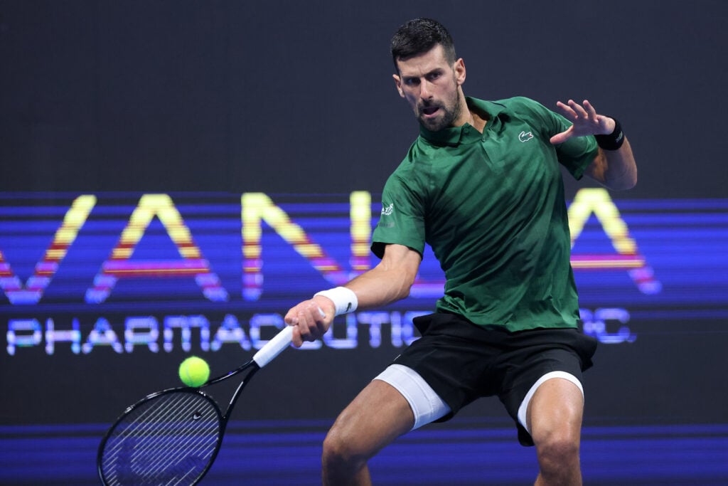 Novak Djokovic hits a forehand