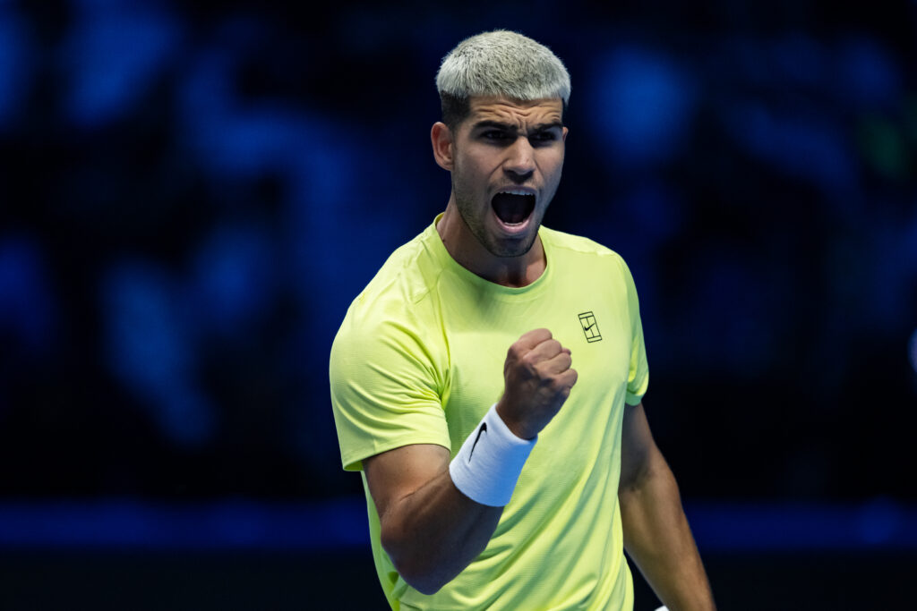Carlos Alcaraz celebrates after beating Taylor Fritz at the 2025 ATP Finals