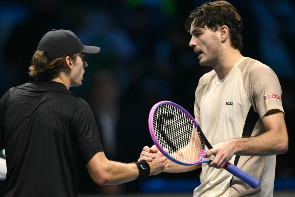 Alex de Minaur and Taylor Fritz shake hands after their match at the ATP Finals.