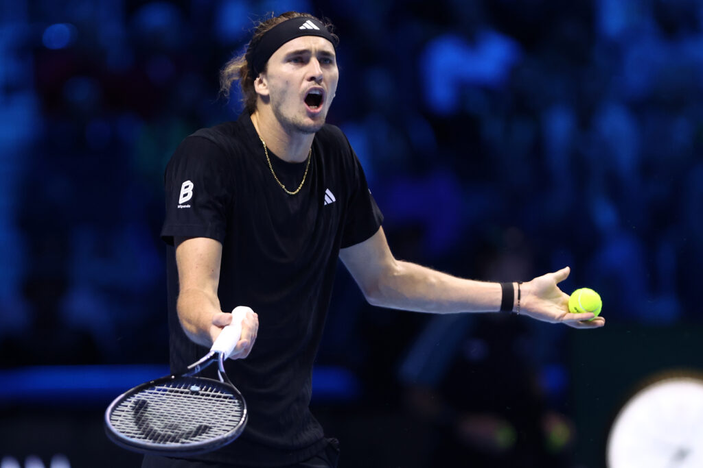 Alexander Zverev holds out his arms in complaint