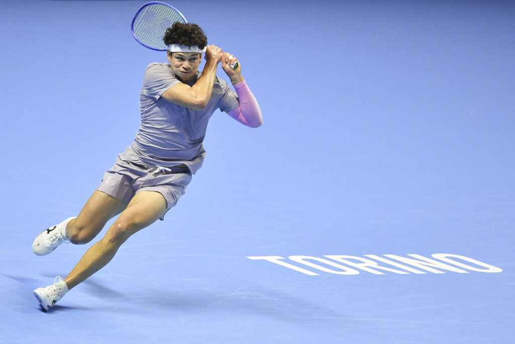 Ben Shelton in action against Jannik Sinner at the 2025 ATP Finals