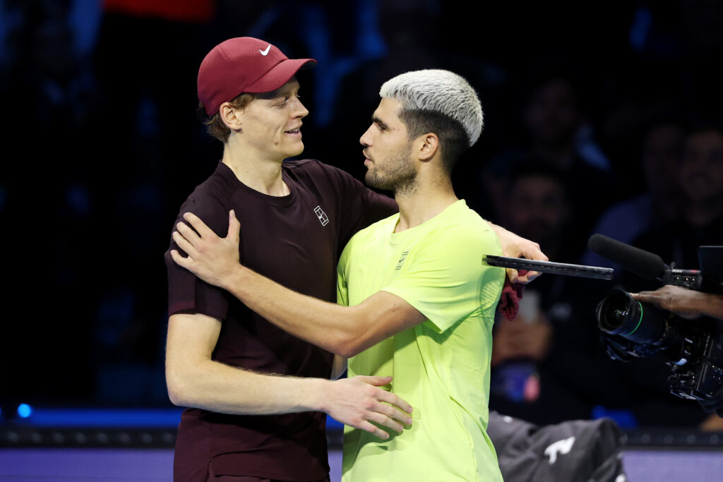 Carlos Alcaraz and Jannik Sinner embrace