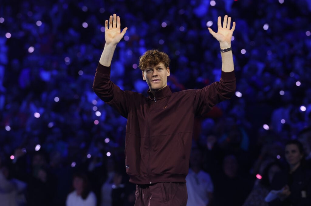 Jannik Sinner waves to the crowd after winning the 2025 ATP Finals