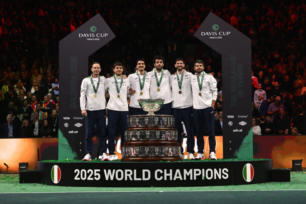 Captain Filippo Volandri, Flavio Cobolli, Lorenzo Sonego, Matteo Berrettini, Andrea Vavassori and Simone Bolelli of Italy pose with the International Lawn Tennis Challenge Trophy following victory in the Davis Cup.