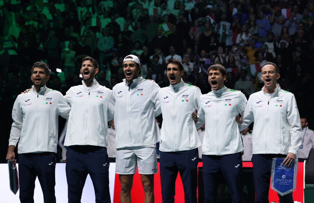 Simone Bolelli, Andrea Vavassori, Matteo Berrettini, Lorenzo Sonego, Flavio Cobolli and team captain of Italy Filippo Volandri sing the Italian National Anthem before the Davis Cup Final match against Spain.