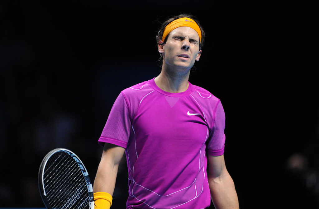 Rafael Nadal reacts during his defeat to Roger Federer at the 2010 ATP Finals