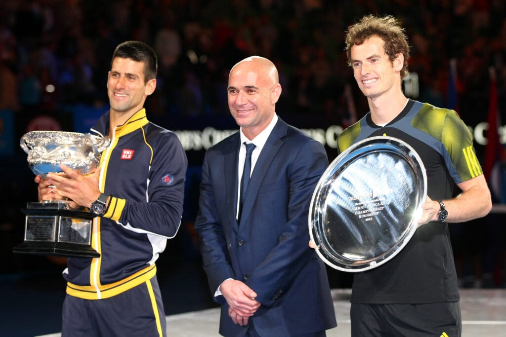 Novak Djokovic, Andre Agassi and Andy Murray pose during the 2013 Australian Open final award ceremony.