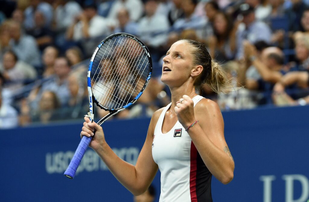 Karolina Pliskova pumps her fists in celebration