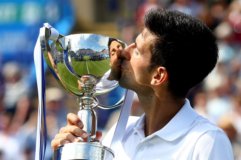 Novak Djokovic celebrates after winning Eastbourne in 2017