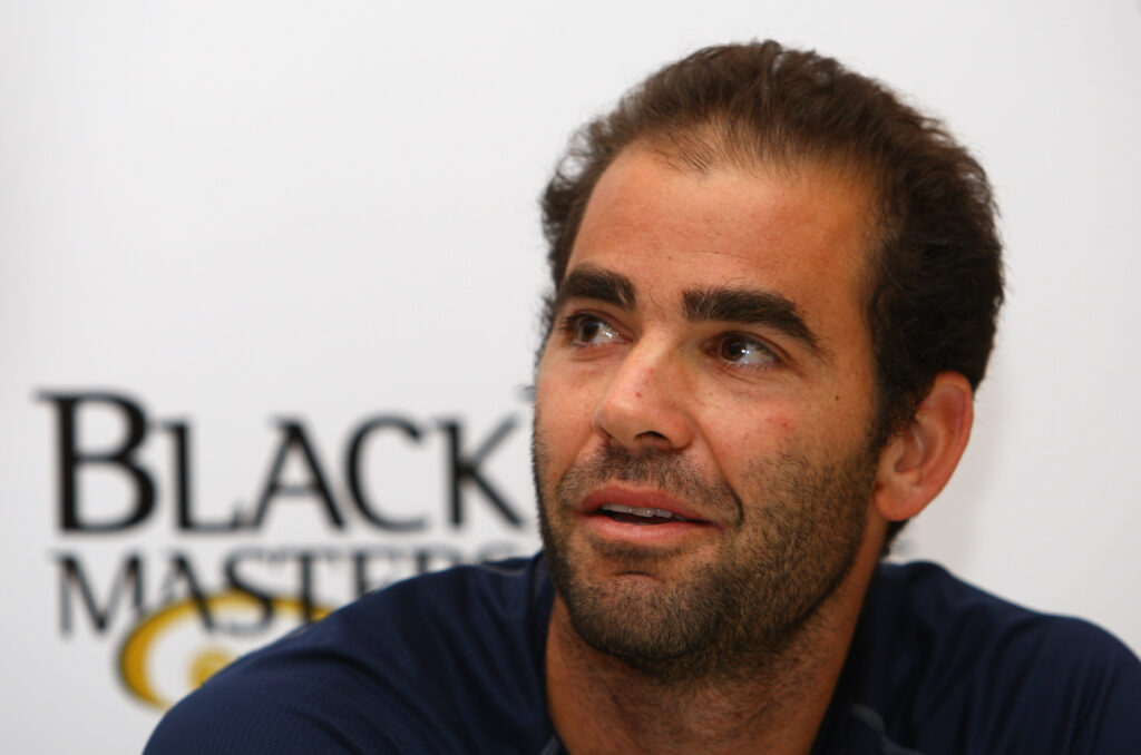 Pete Sampras answers questions during a press conference in 2008