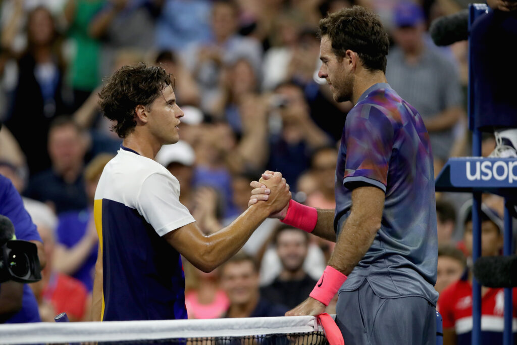 Dominic Thiem and Juan Martin del Potro shake hands at the net