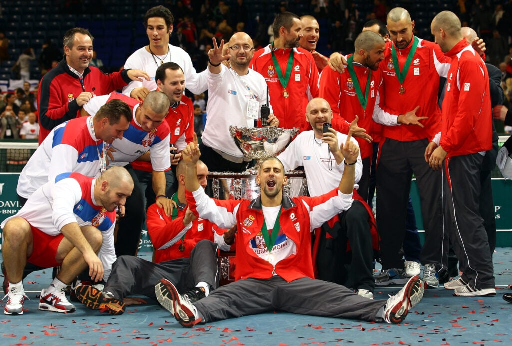 Novak Djokovic and Team Serbia celebrate after winning the 2010 Davis Cup